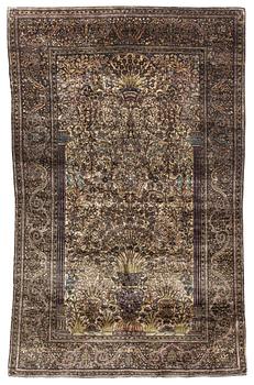 330. An antique silk Feraghan carpet, c. 195 x 121 cm.