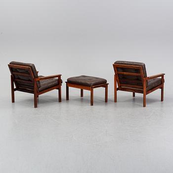 Illum Wikkelsö, a pair of 'Capella' easy chairs and one stool. Eilersen, Denmark. Designed 1959.