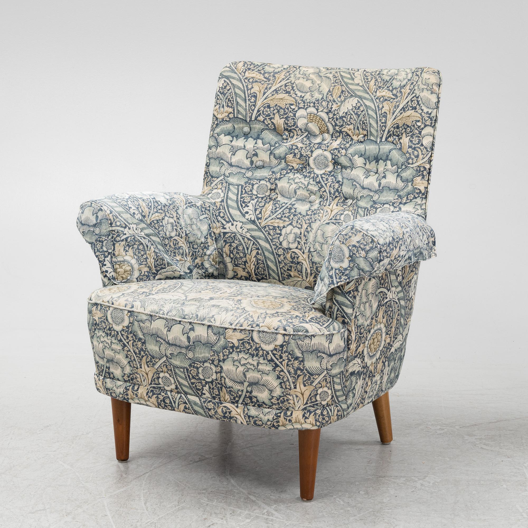 Carl Malmsten, a pair of Hemmakväll easy chairs .
