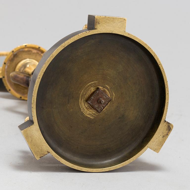 AN EMPIRE ORMOLU TABLE MIRROR, first half of the 19th century.