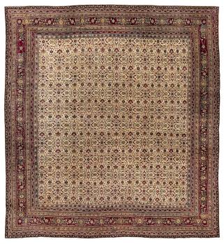 425. An antique Agra carpet, north India c. 430 x 392 cm.