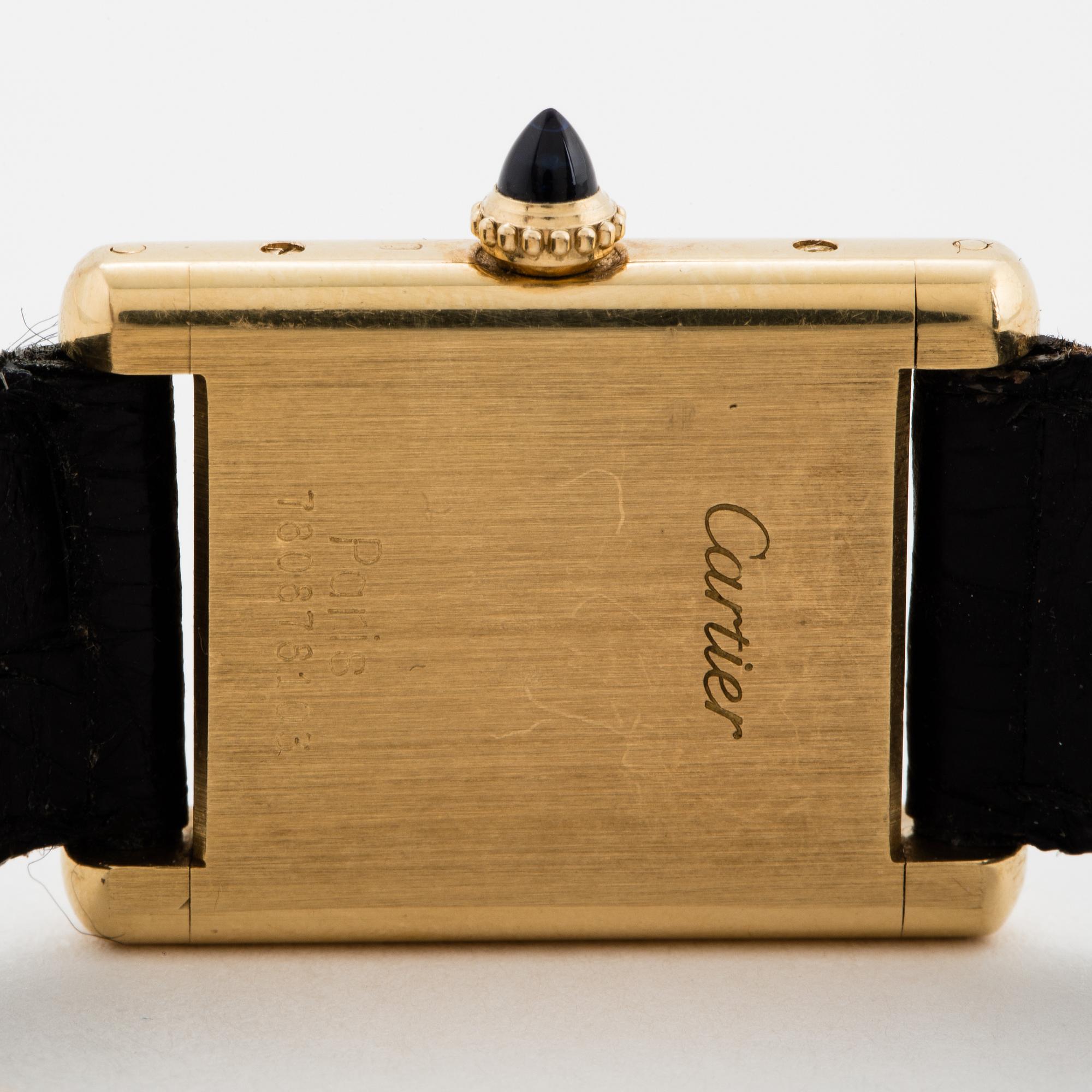 Cartier, Tank, wristwatch, 20,5, x 20 (28) mm.
