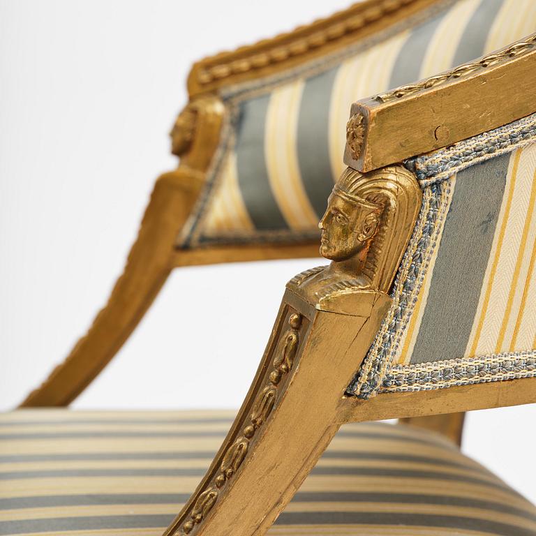 A pair of late Gustavian open armchairs attributed to E. Ståhl (master in Stockholm 1794-1820).