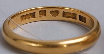 RING samt BROSCH, guld.