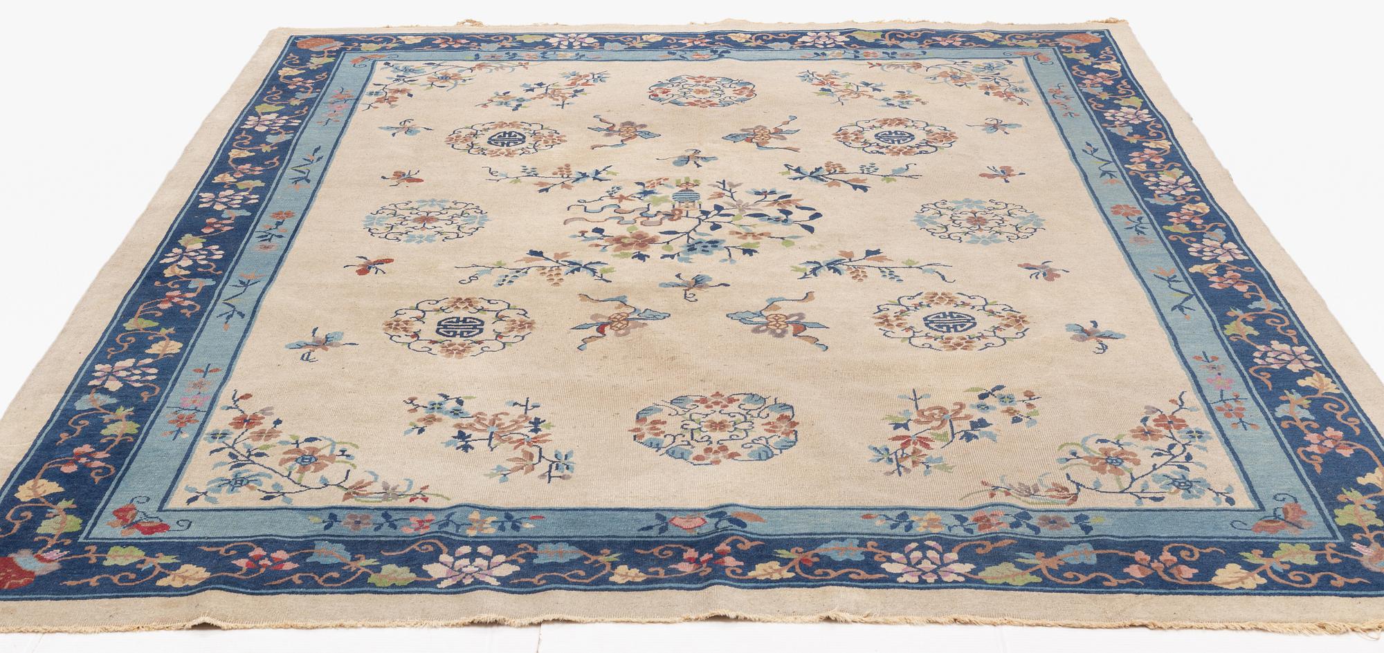A Chinese semi-antique carpet, 357 x 270.