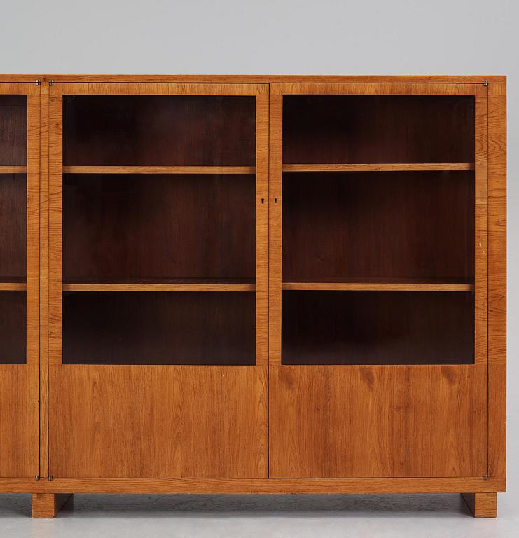 Carl Malmsten, a walnut bookcase, Sweden, 1930s.