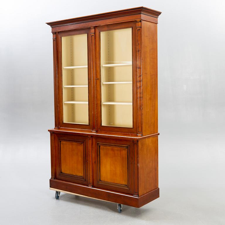 A modern mahogany display cabinet.