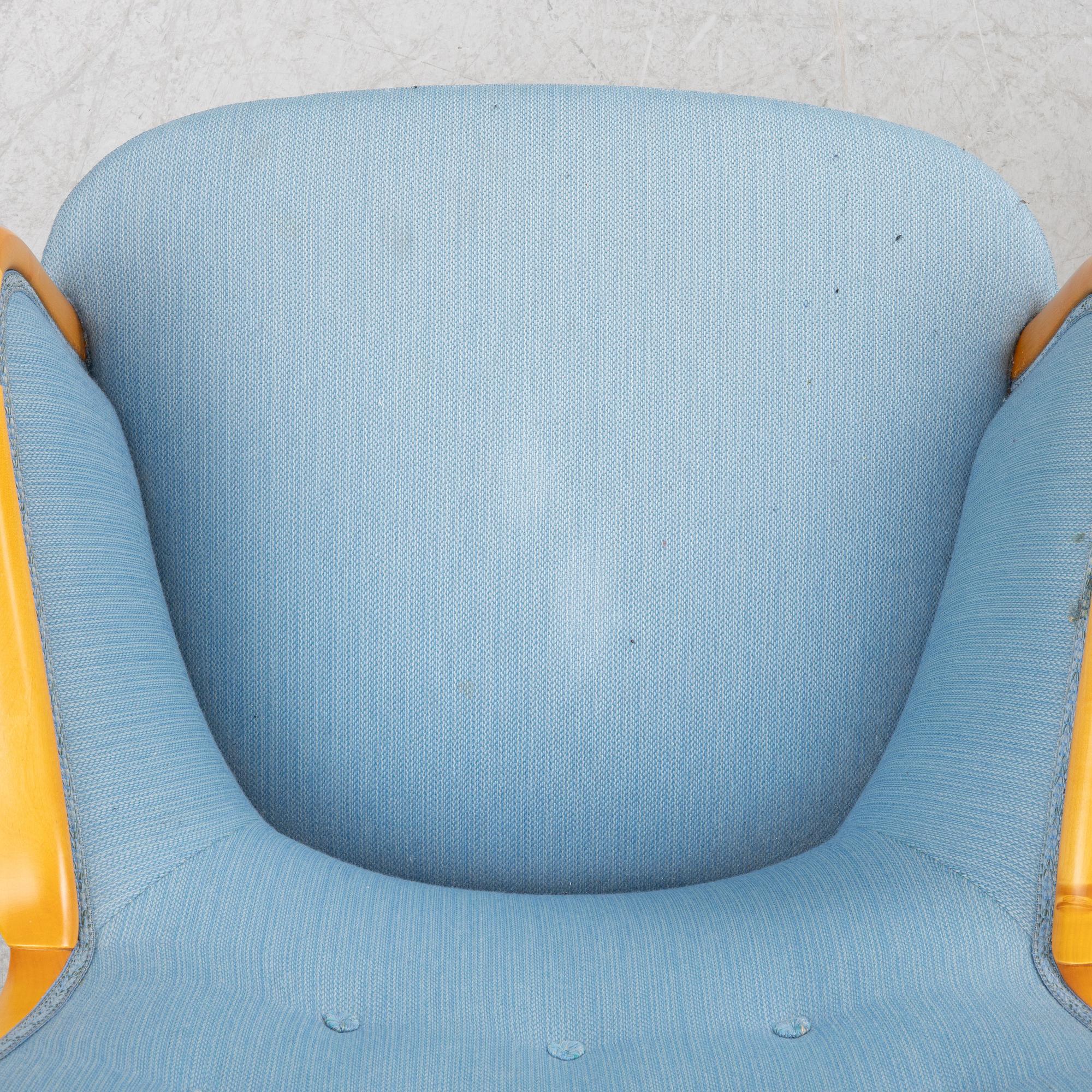 Carl Malmsten, a pair of "Advokaten" armchairs, Sweden, later part of the 20th century.