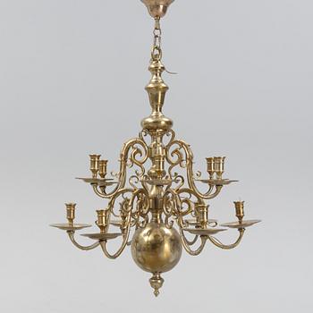 A brass Baroque style chandelier, 20th Century.
