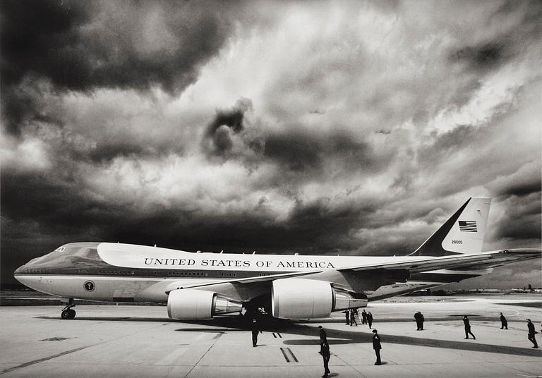 Brooks Kraft, "Storm clouds loom overhead as Air Force One and U.S. President George W. Bush arrive in Paris", 2003.
