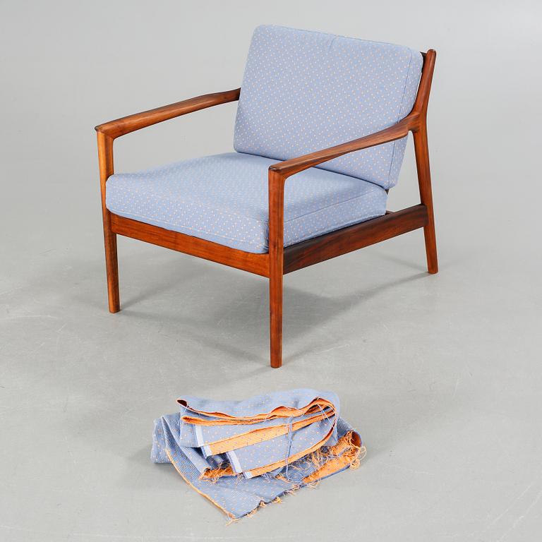 A mid 20th century "USA 75" chair, designed by Folke Ohlsson for Dux Möbel AB 1963.