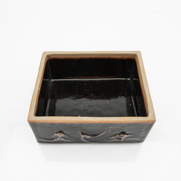 A glazed stone ware box.