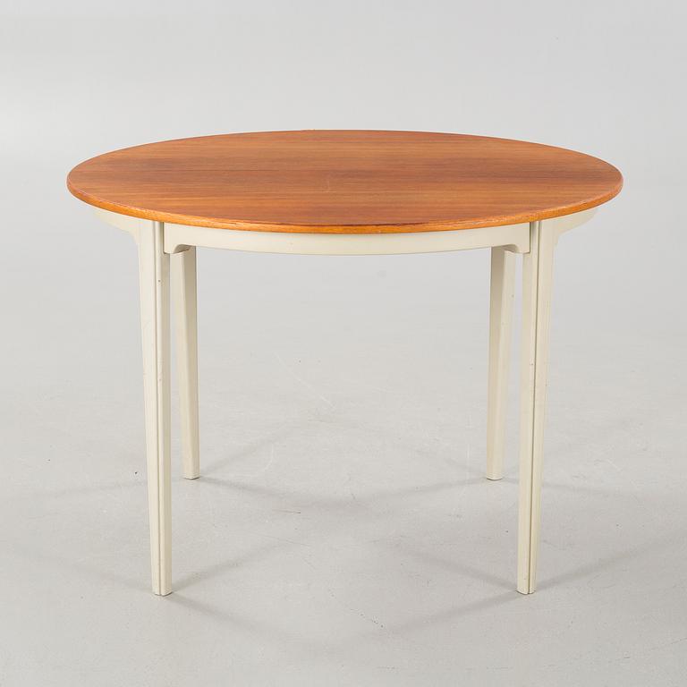 Four chairs and a dining table, probably Karl Andersson & Söner, second half of the 20th century.