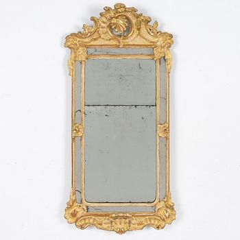 A giltwood rococo mirror, Stockholm, later part 18th century.