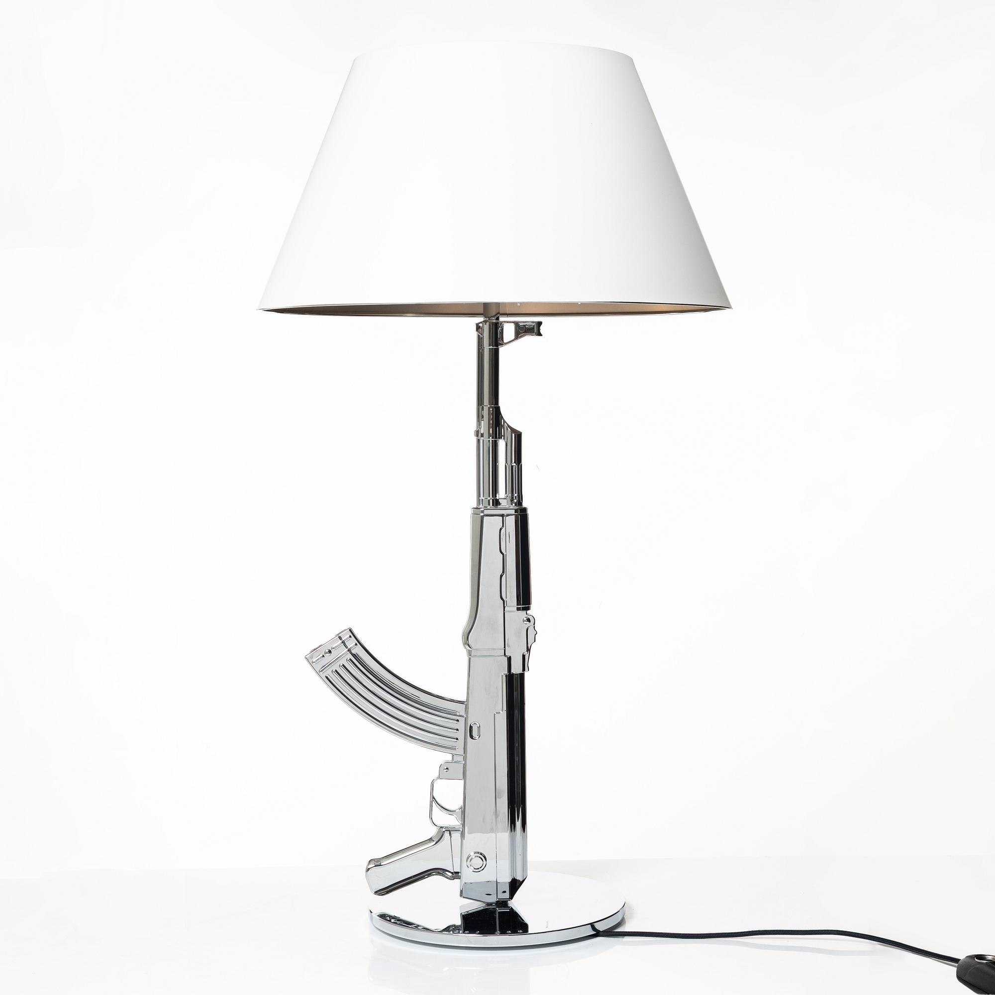 Philippe Starck, a table lamp, 'Table Gun Lamp', FLOS, Italy.