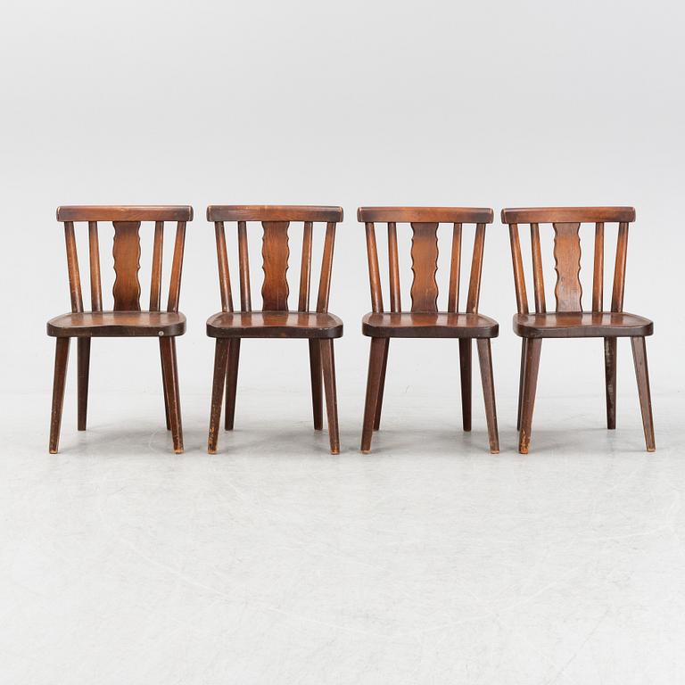 A set of four stained pine chairs from Åby Möbelfabrik, 1940s.