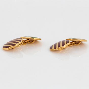 A pair of Tiffany cufflinks in 18K gold with enamel decoration.