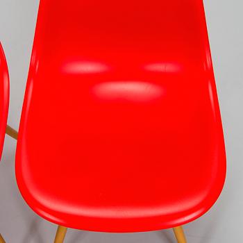 Charles & Ray Eames, two 'Plastic Chair DSW' chairs, Vitra.