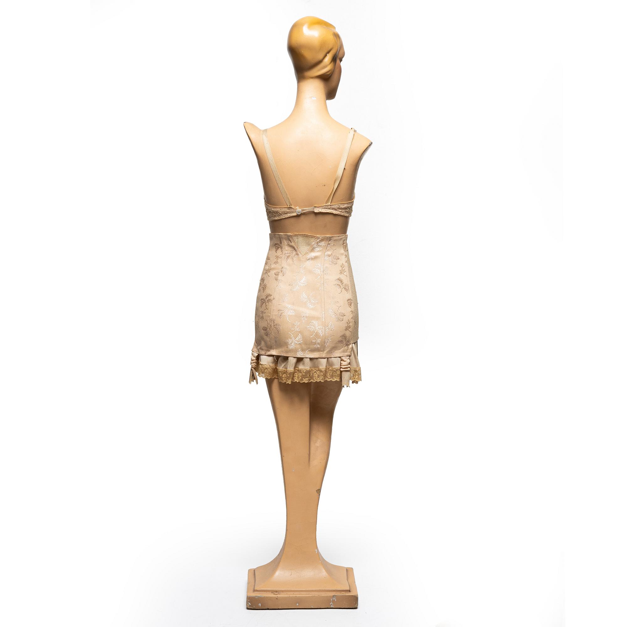 A 1930's storefront mannequin.