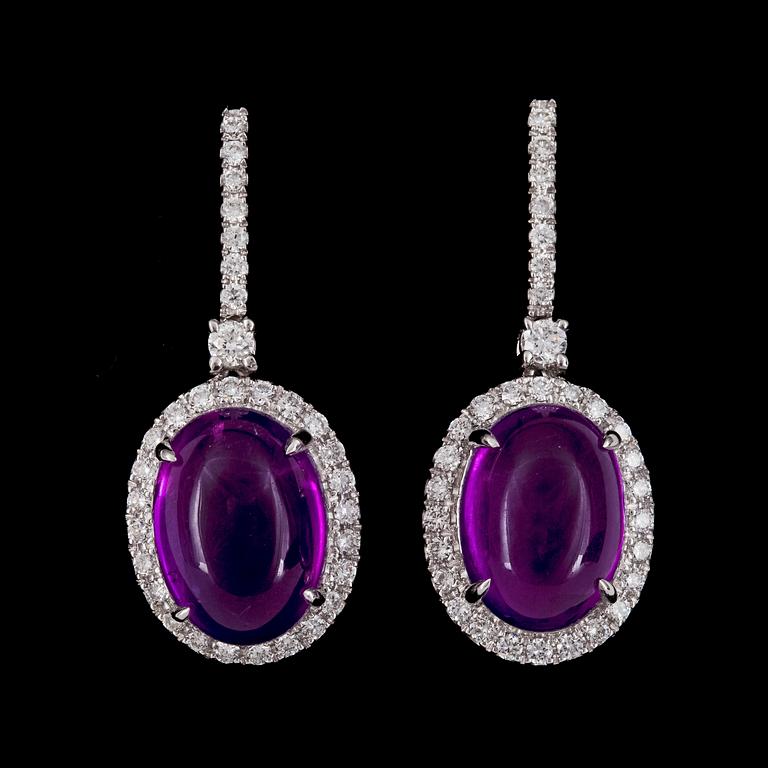 EARRINGS, cabochon cut amethysts and brilliant cut diamonds, tot. 0.75 cts.