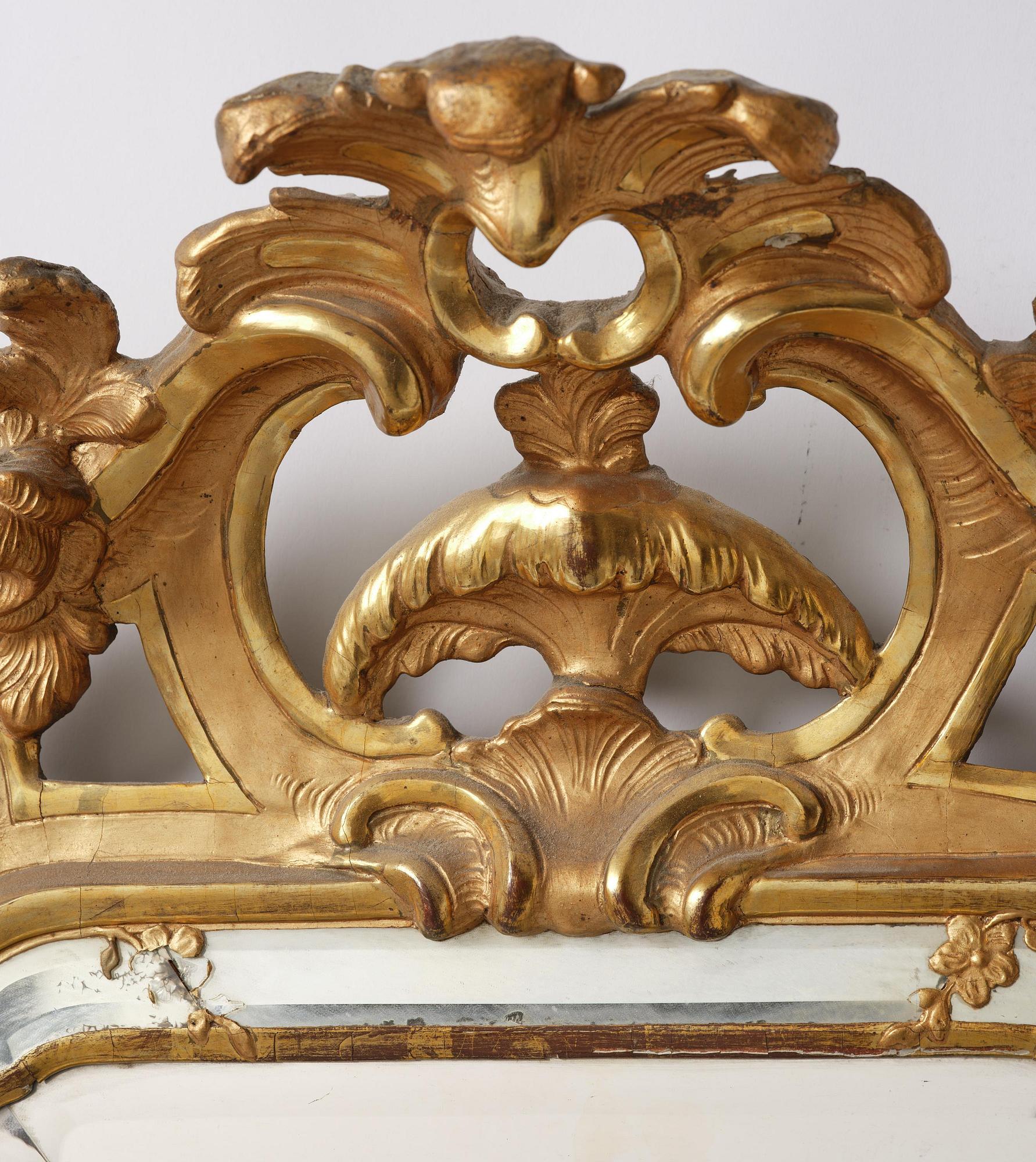 A rococo giltwood mirror, Stockholm, later part 18th century.