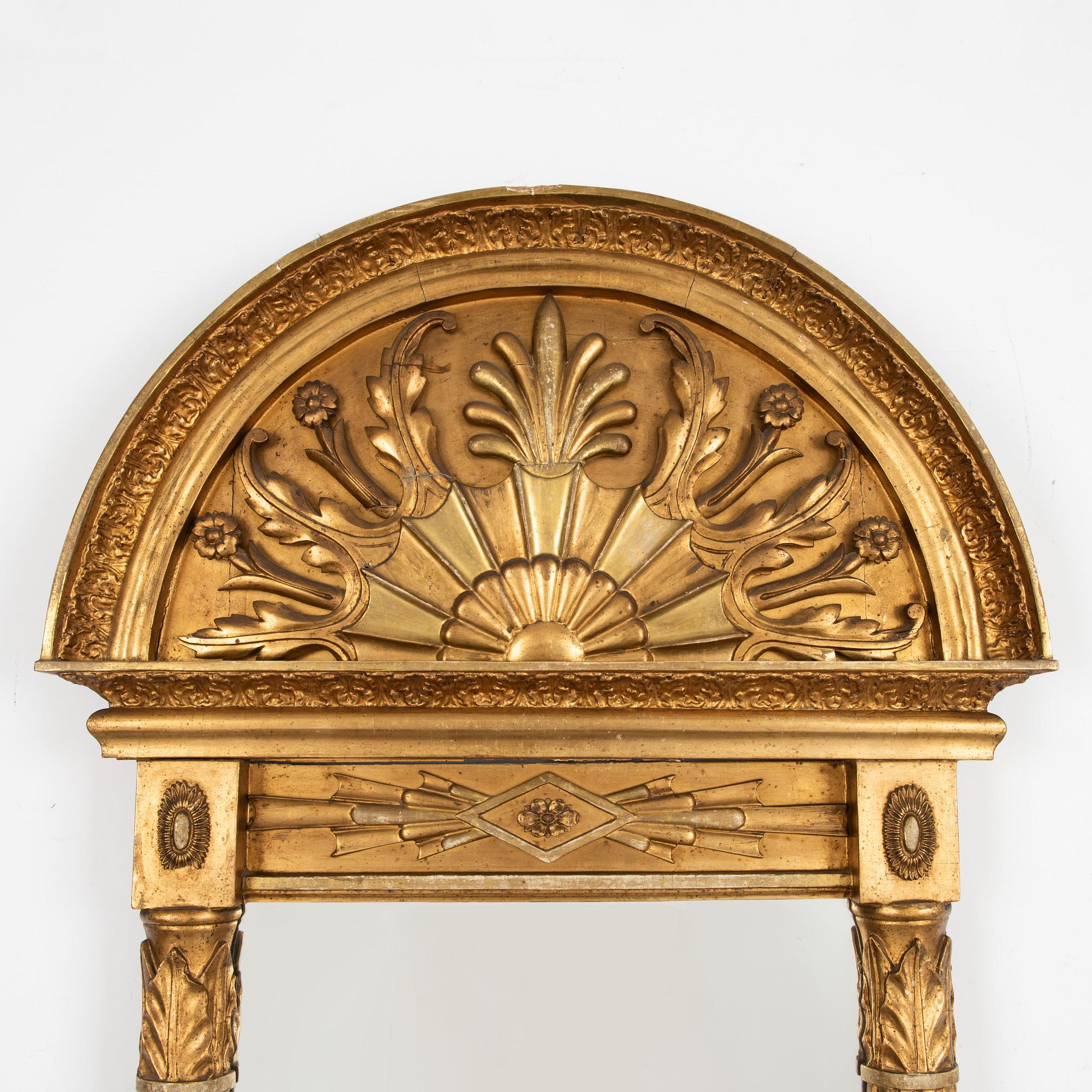 An Empire mirrot, first half of the 19th century.
