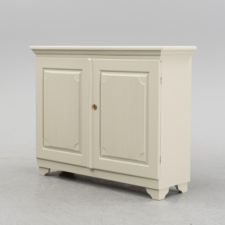 A painted 20th Century cupboard.