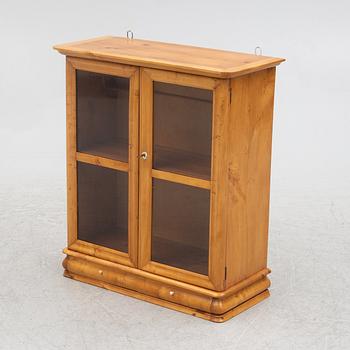 A small wall cabinet, around 1900.