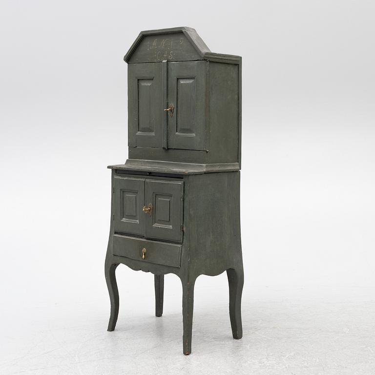 A painted cabinet, about 1800.