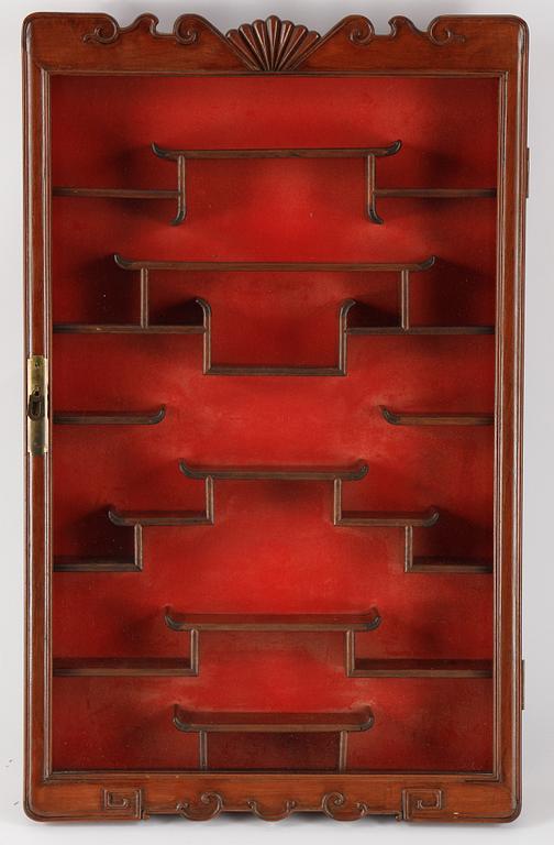 A Chinese wall display cabinet, second half of the 20th century.