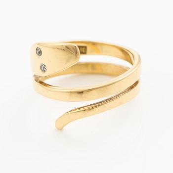 Sven-Erik Högberg, a ring in the form of a snake, 18K gold with round brilliant-cut diamonds, Gothenburg 1986.