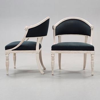 A pair of late Gustavian early 19th century armchairs.