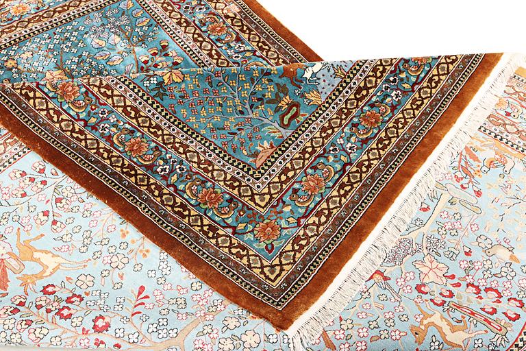 An all silk oriental carpet, a. 280 x 185 cm.