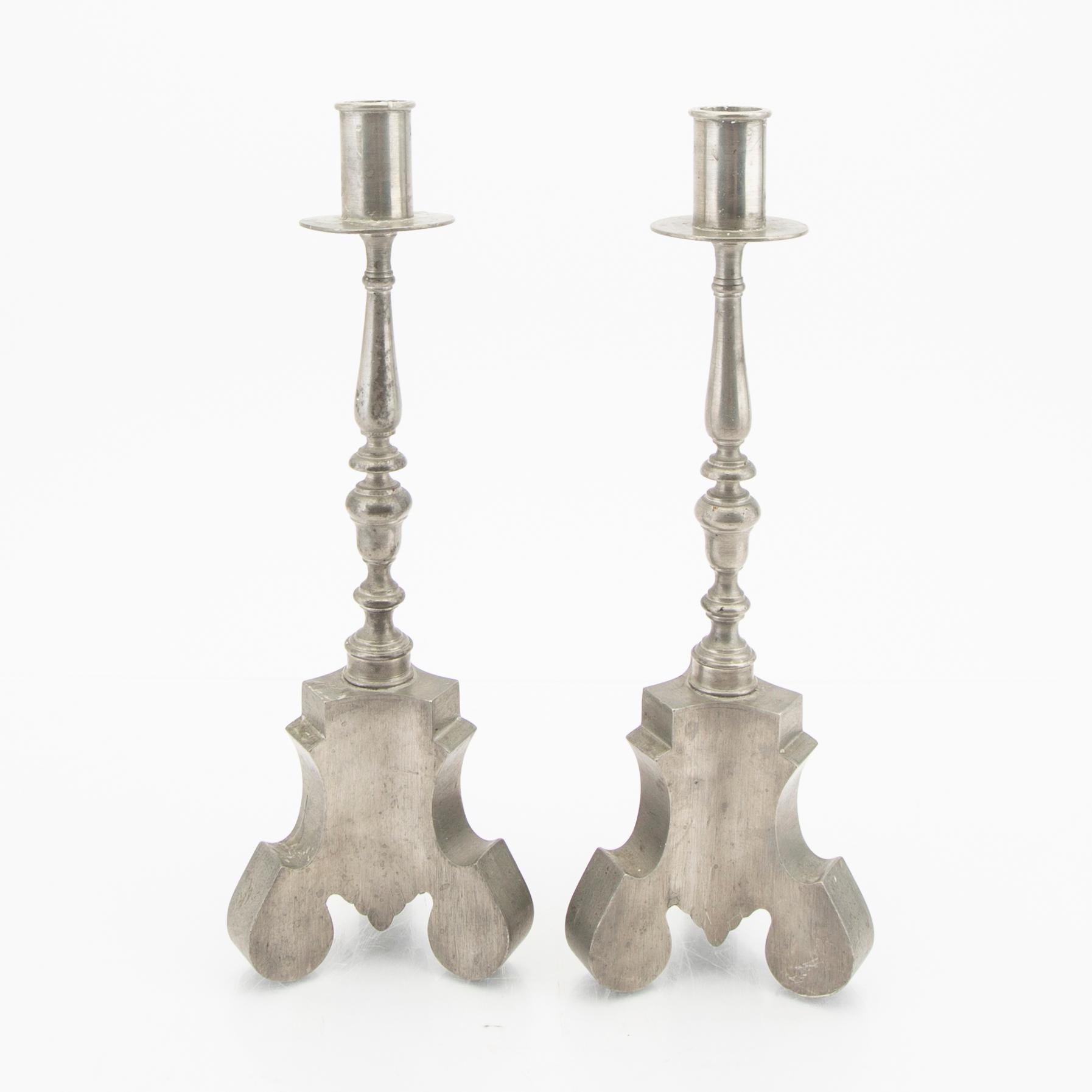 Firma Svenskt Tenn,  a pair of 1928 pewter candle sticks.