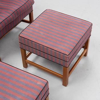 Kaare Klint, a pair of model 6212 armchairs with ottomans, Rud Rasmussen, Denmark.