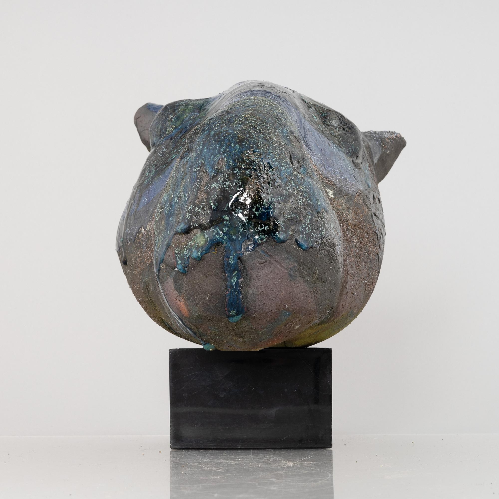 Henrik Allert, a stoneware sculpture of an animal's head, signed.