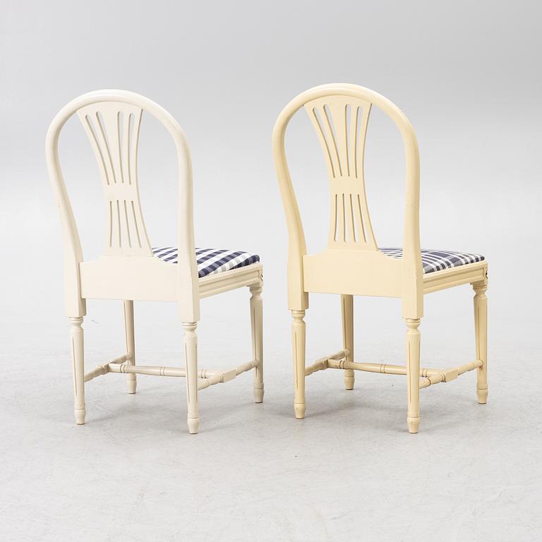 Dining table with 10 chairs, Gustavian style, second half of the 20th century.