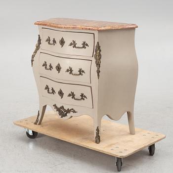 A Rococo style chest of drawers, early 20th century.