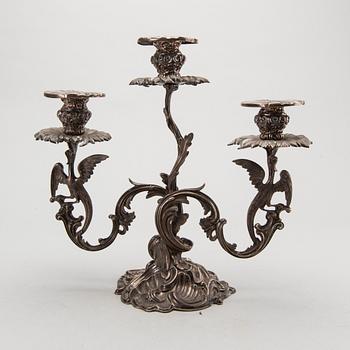 A pair of Swedish silver candelabra mark of GUSTAF MÖLLENBORG Stockholm 1846 , total weight ca 4420 gr, height 31 cm.