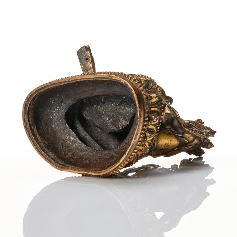 A large gilt copper alloy figure of Tara, Ming dynasty (1368-1644).