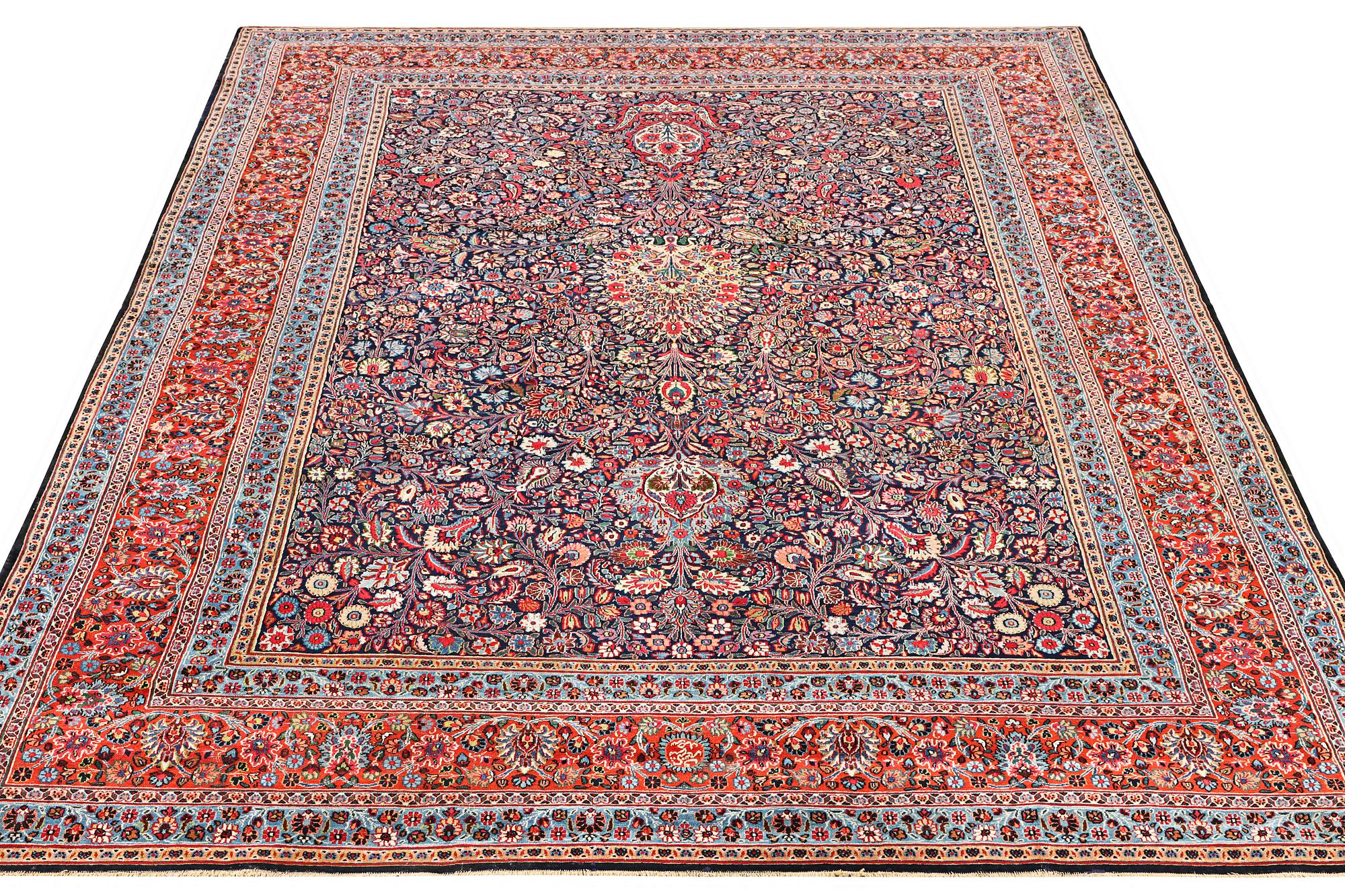 A semi-antique Meshad carpet, a. 360 x 252 cm.