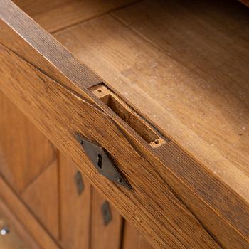 A Gustavian style cupboard, around the year 1900.