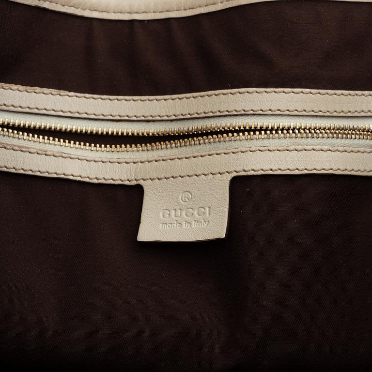 Gucci, leather bag.