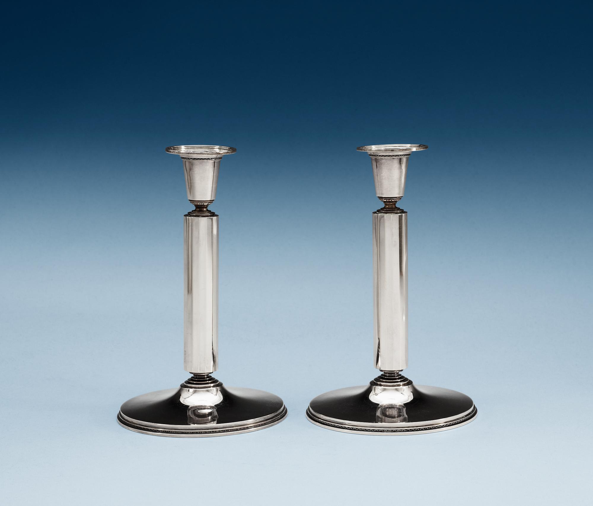 A pair of Atelier Borgila sterling candlesticks, Stockholm 1950.