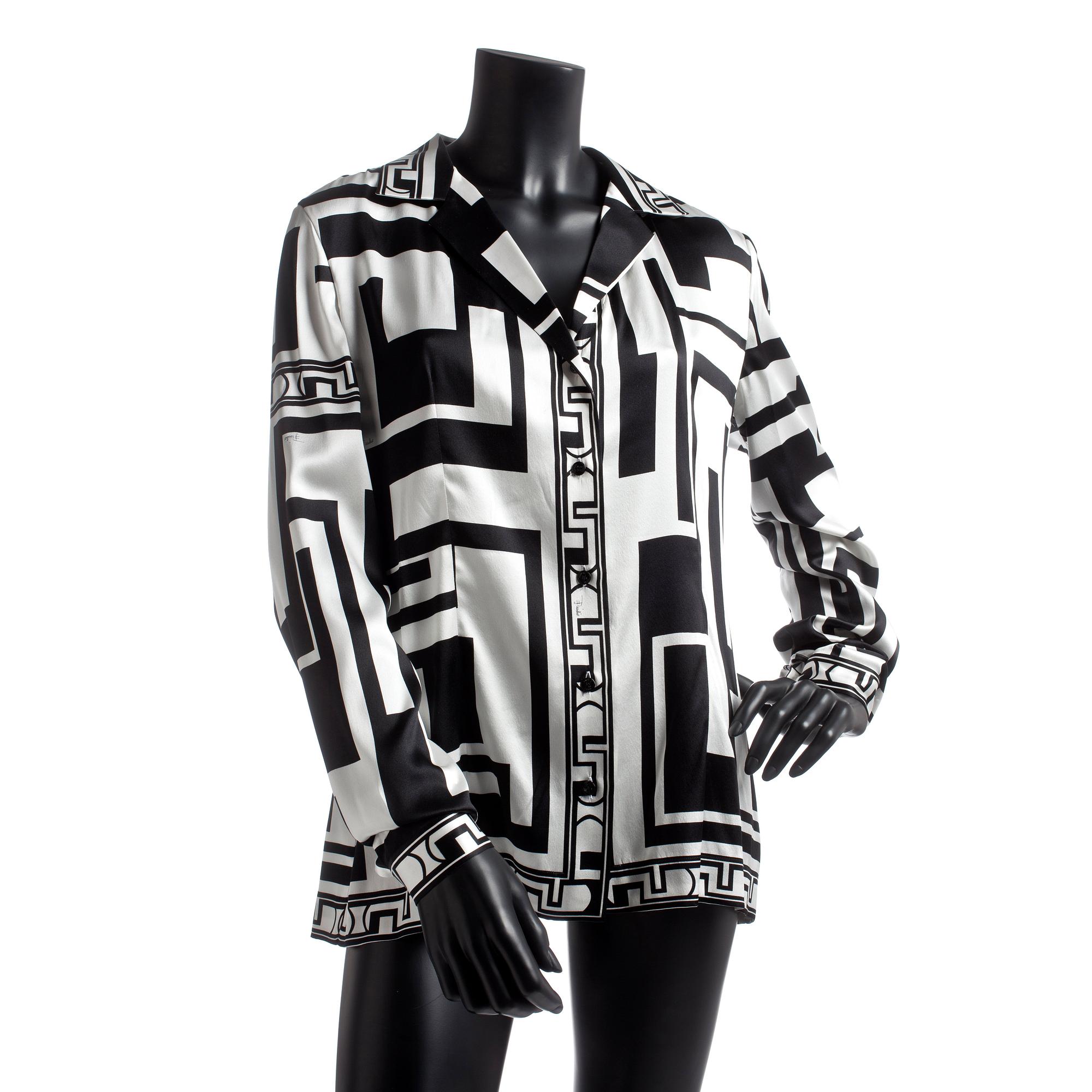 EMILIO PUCCI, a silk shirt with belt.