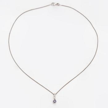 An 18K white gold necklace with a tanzanite and diamonds ca. 0.06 ct in total.