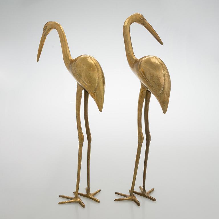 A pair of brass figurines, 20th/21st century.