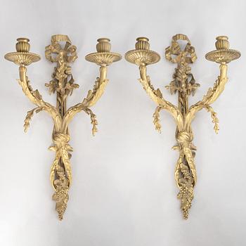 A pair of wall lights, Louis XVI style, early 20th century.