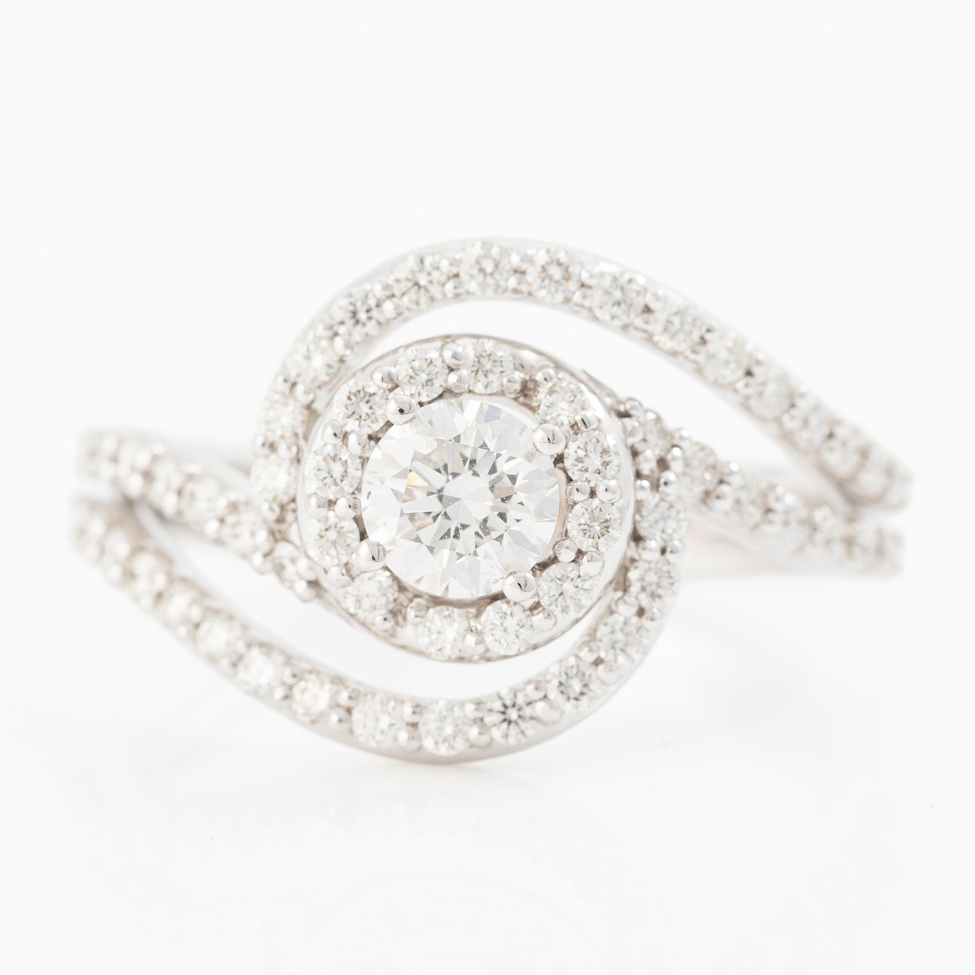 Ring 14K white gold set with round brilliant-cut diamonds.