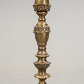 a early 20h Century brass floor lamp.